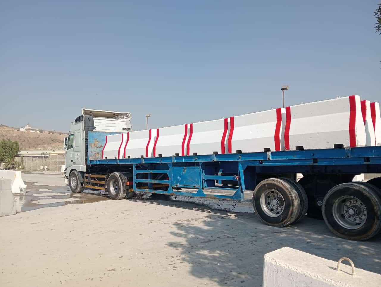 Defense Concrete Block Barriers and Bulk Cement Heavy Transport Fleet